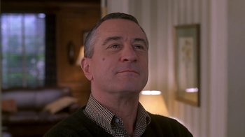 Movie still from “Meet the Parents” (2000), directed by Jay Roach – A person looking at the camera; Close Up shot, Low angle