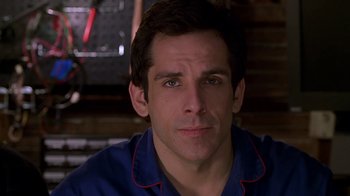Movie still from “Meet the Parents” (2000), directed by Jay Roach – A person wearing a blue shirt; Close Up shot, Low angle
