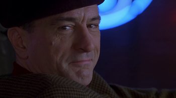Movie still from “Meet the Parents” (2000), directed by Jay Roach – A person wearing a hat; Close Up shot, Low angle