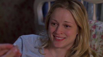 Movie still from “Meet the Parents” (2000), directed by Jay Roach – A person with a smile on their face; Close Up shot, Over the shoulder angle