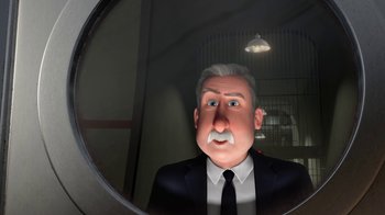 Movie still from “Megamind” (2010), directed by Tom McGrath – An animated man in a suit and tie looking into a mirror; Close Up shot, Over the shoulder angle