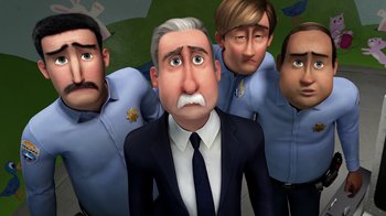 Movie still from “Megamind” (2010), directed by Tom McGrath – A group of men standing next to each other; Close Up shot, Low angle