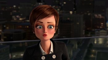 Movie still from “Megamind” (2010), directed by Tom McGrath – An animated woman with short brown hair wearing a black jacket; Close Up shot, Over the shoulder angle