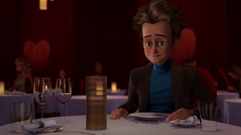Movie still from “Megamind” (2010), directed by Tom McGrath – A man sitting at a table with a glass of wine in front of him; Medium shot, Over the shoulder angle