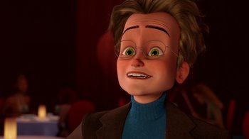 Movie still from “Megamind” (2010), directed by Tom McGrath – An animated person with green eyes and brown hair; Close Up shot, Over the shoulder angle