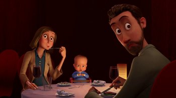 Movie still from “Megamind” (2010), directed by Tom McGrath – An animated family sitting at a dinner table; Medium shot, Over the shoulder angle
