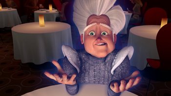 Movie still from “Megamind” (2010), directed by Tom McGrath – An animated figure of a person with white hair; Medium shot, Over the shoulder angle