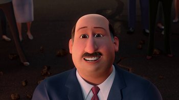 Movie still from “Megamind” (2010), directed by Tom McGrath – An animated man in a suit and tie; Close Up shot, Over the shoulder angle