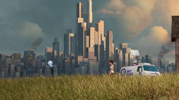 Movie still from “Megamind” (2010), directed by Tom McGrath – An image of a woman in a field near a city; Extreme Wide shot, Low angle