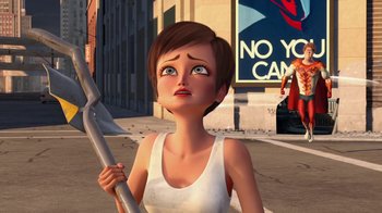 Movie still from “Megamind” (2010), directed by Tom McGrath – An animated woman holding an object in her hand; Medium shot, Low angle