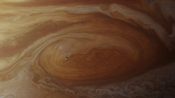 Movie still from “Men, Women & Children” (2014), directed by Jason Reitman – A man flying a kite in front of a large cloud of brown water; Extreme Wide shot, Overhead angle