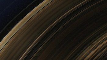 Movie still from “Men, Women & Children” (2014), directed by Jason Reitman – View of the rings of saturn; Extreme Wide shot, Overhead angle