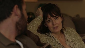 Movie still from “Men, Women & Children” (2014), directed by Jason Reitman – A woman sitting next to a man on a couch; Close Up shot, Over the shoulder angle