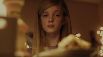 Movie still from “Men, Women & Children” (2014), directed by Jason Reitman – A young girl is looking at a plate of food; Close Up shot, Over the shoulder angle