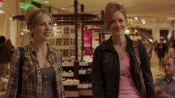 Movie still from “Men, Women & Children” (2014), directed by Jason Reitman – Two women standing next to each other in a store; Medium shot, Over the shoulder angle