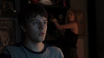 Movie still from “Men, Women & Children” (2014), directed by Jason Reitman – A man and a woman in a dark room; Medium shot, Over the shoulder angle