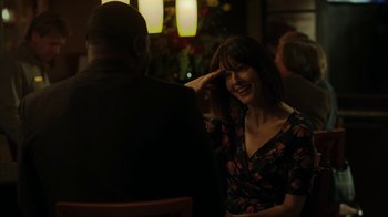 Movie still from “Men, Women & Children” (2014), directed by Jason Reitman – A woman sitting next to a man at a table; Medium shot, Over the shoulder angle