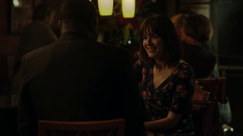 Movie still from “Men, Women & Children” (2014), directed by Jason Reitman – A woman sitting next to a man at a table; Medium shot, Over the shoulder angle