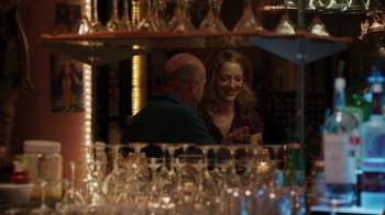 Movie still from “Men, Women & Children” (2014), directed by Jason Reitman – A man and a woman are talking in front of a mirror; Medium shot, Over the shoulder angle