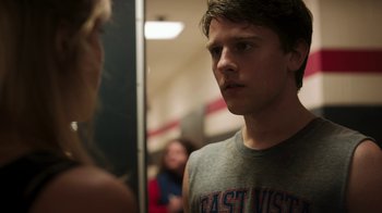 Movie still from “Men, Women & Children” (2014), directed by Jason Reitman – A young man standing in front of a mirror; Close Up shot, Over the shoulder angle