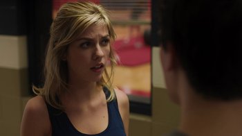 Movie still from “Men, Women & Children” (2014), directed by Jason Reitman – A woman is looking at a man in the mirror; Close Up shot, Over the shoulder angle