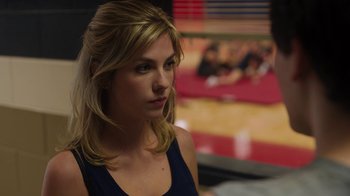 Movie still from “Men, Women & Children” (2014), directed by Jason Reitman – A beautiful blonde woman with a serious look; Close Up shot, Over the shoulder angle