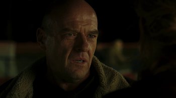 Movie still from “Men, Women & Children” (2014), directed by Jason Reitman – An older bald man with a towel around his neck; Close Up shot, Over the shoulder angle