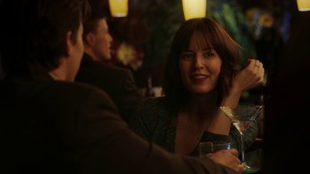 Movie still from “Men, Women & Children” (2014), directed by Jason Reitman – A woman sitting next to a man holding a wine glass; Close Up shot, Over the shoulder angle