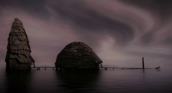 Movie still from “Mirror Mirror” (2012), directed by Tarsem Singh – An image of an island in the middle of the ocean; Extreme Wide shot, Low angle