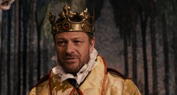 Movie still from “Mirror Mirror” (2012), directed by Tarsem Singh – A person wearing a crown; Close Up shot, Over the shoulder angle