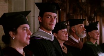 Movie still from “Mona Lisa Smile” (2003), directed by Mike Newell – A group of people wearing graduation caps and gowns; Close Up shot, High angle