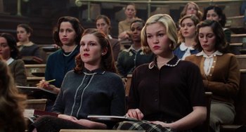 Movie still from “Mona Lisa Smile” (2003), directed by Mike Newell – A group of people sitting in a room; Medium shot, High angle