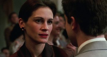 Movie still from “Mona Lisa Smile” (2003), directed by Mike Newell – A person looking at the camera; Close Up shot, Over the shoulder angle