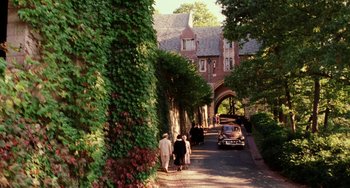Movie still from “Mona Lisa Smile” (2003), directed by Mike Newell – A group of people walking down a street; Extreme Wide shot, High angle