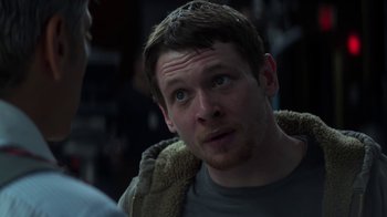 Movie still from “Money Monster” (2016), directed by Jodie Foster – A person looking at the camera; Close Up shot, Over the shoulder angle