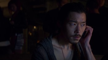 Movie still from “Money Monster” (2016), directed by Jodie Foster – A person wearing a sweater; Close Up shot, High angle