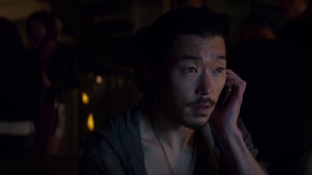 Movie still from “Money Monster” (2016), directed by Jodie Foster – A man is talking on a cell phone in the dark; Close Up shot, High angle