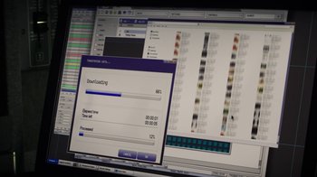 Movie still from “Money Monster” (2016), directed by Jodie Foster – A computer screen with a computer screen showing a computer; Extreme Close Up shot, High angle