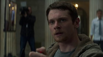 Movie still from “Money Monster” (2016), directed by Jodie Foster – A person with a camera; Close Up shot, Over the shoulder angle