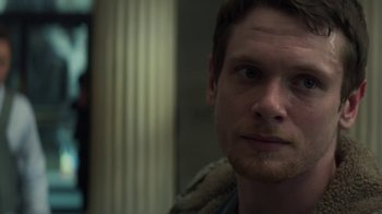 Movie still from “Money Monster” (2016), directed by Jodie Foster – A person looking at the camera; Close Up shot, Over the shoulder angle