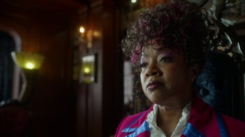 Movie still from “Monster High: The Movie” (2022), directed by Todd Holland – A person wearing a pink and blue shirt; Close Up shot, Over the shoulder angle