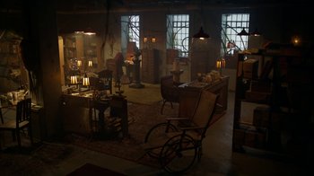Movie still from “Monster High: The Movie” (2022), directed by Todd Holland – A room filled with lots of furniture and candles; Extreme Wide shot, High angle