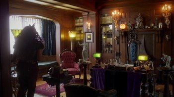 Movie still from “Monster High: The Movie” (2022), directed by Todd Holland – A living room filled with lots of furniture and lights; Wide shot, High angle