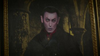 Movie still from “Monster High: The Movie” (2022), directed by Todd Holland – A painting of a man with a pointy face; Close Up shot, Low angle