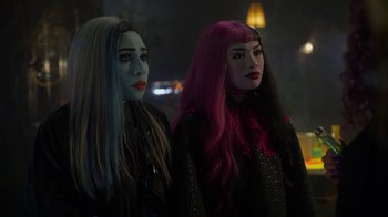 Movie still from “Monster High: The Movie” (2022), directed by Todd Holland – A couple of women standing next to each other; Medium shot, Over the shoulder angle