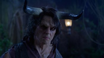 Movie still from “Monster High: The Movie” (2022), directed by Todd Holland – A person wearing horns; Close Up shot, Over the shoulder angle