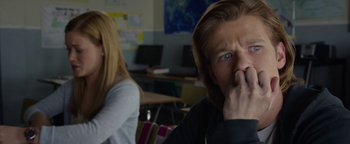Movie still from “Monster Trucks” (2016), directed by Chris Wedge – A man and a woman sitting in front of a computer; Close Up shot, Over the shoulder angle