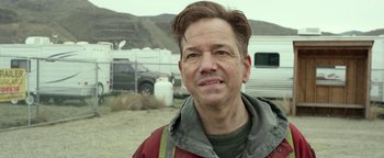 Movie still from “Monster Trucks” (2016), directed by Chris Wedge – A person wearing a jacket; Close Up shot, Over the shoulder angle