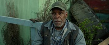 Movie still from “Monster Trucks” (2016), directed by Chris Wedge – An older man wearing a hat and jacket; Close Up shot, Low angle