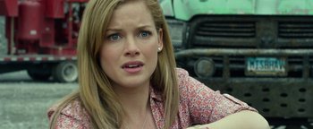 Movie still from “Monster Trucks” (2016), directed by Chris Wedge – A person with long blonde hair; Close Up shot, Over the shoulder angle